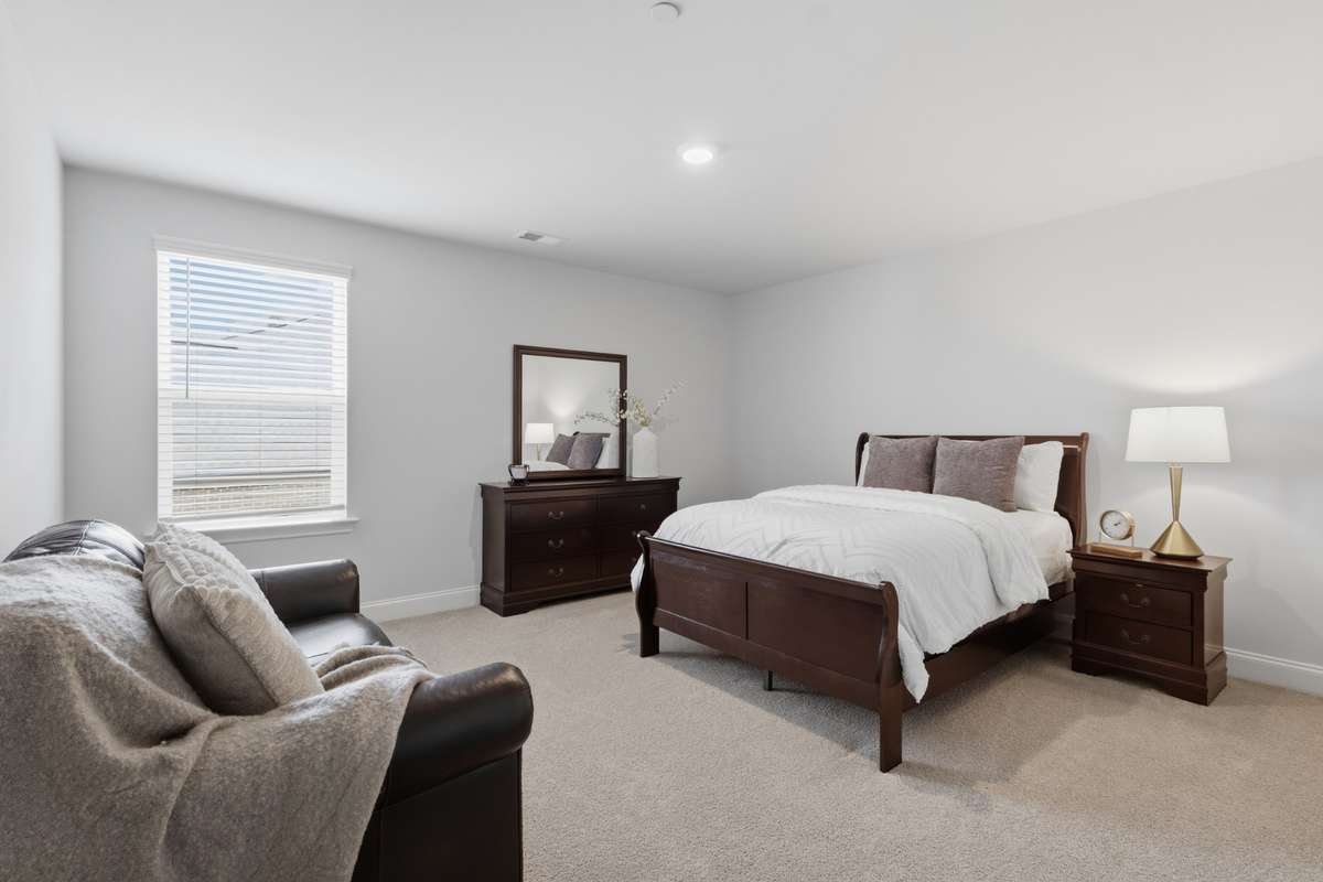 Bedroom 4 is attached to a full bath.  Another large walk-in closet.