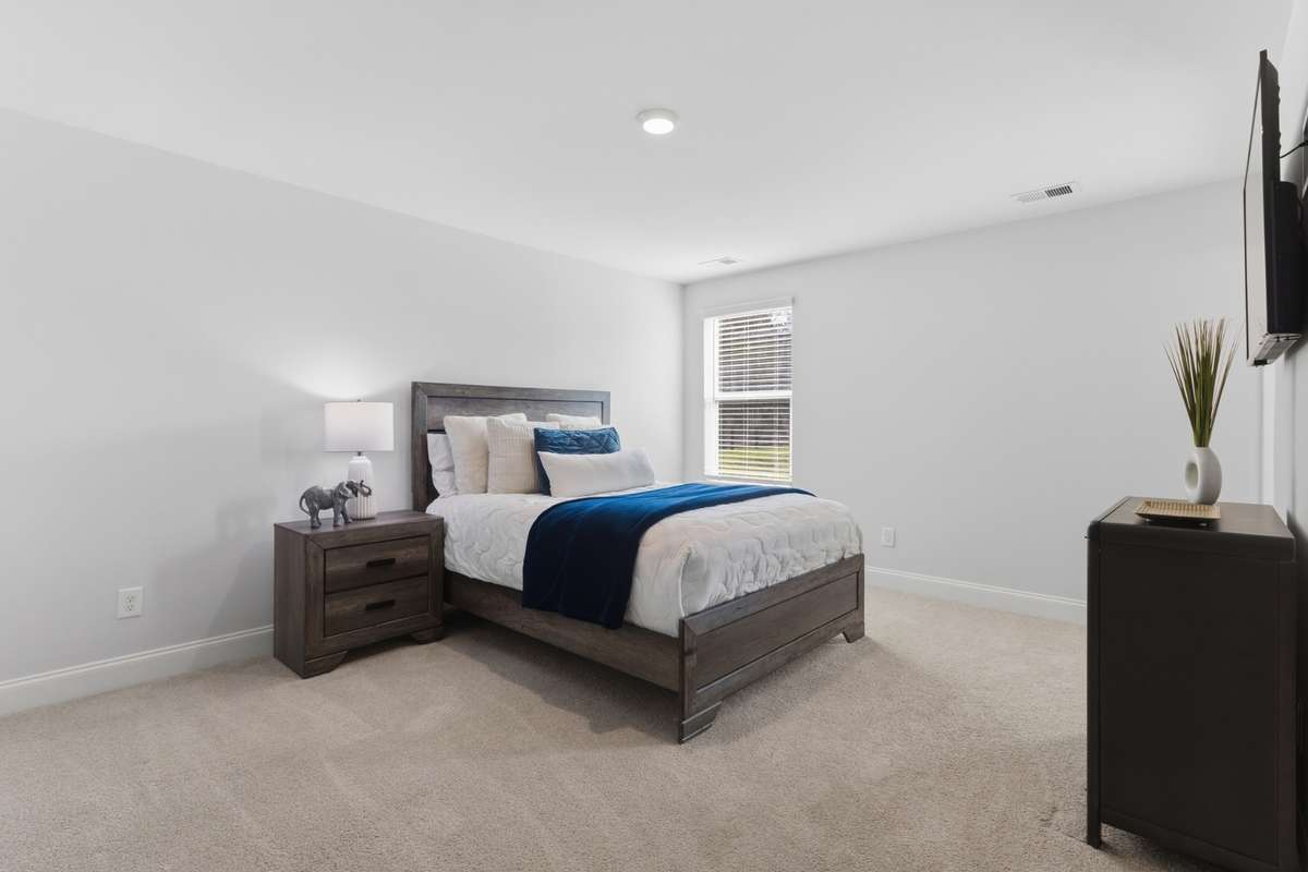 Bedroom 2 has shared bath with separate vanity areas. Large walk-in closet.