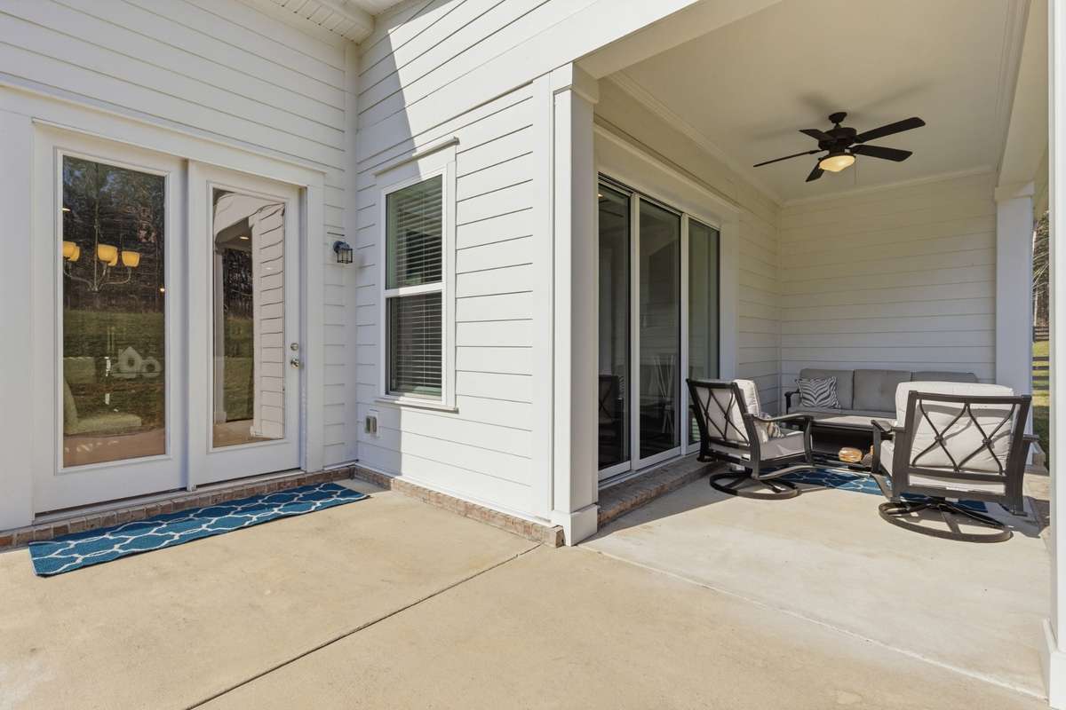 Covered patio and open patio allow for both privacy and easy outdoor grilling.