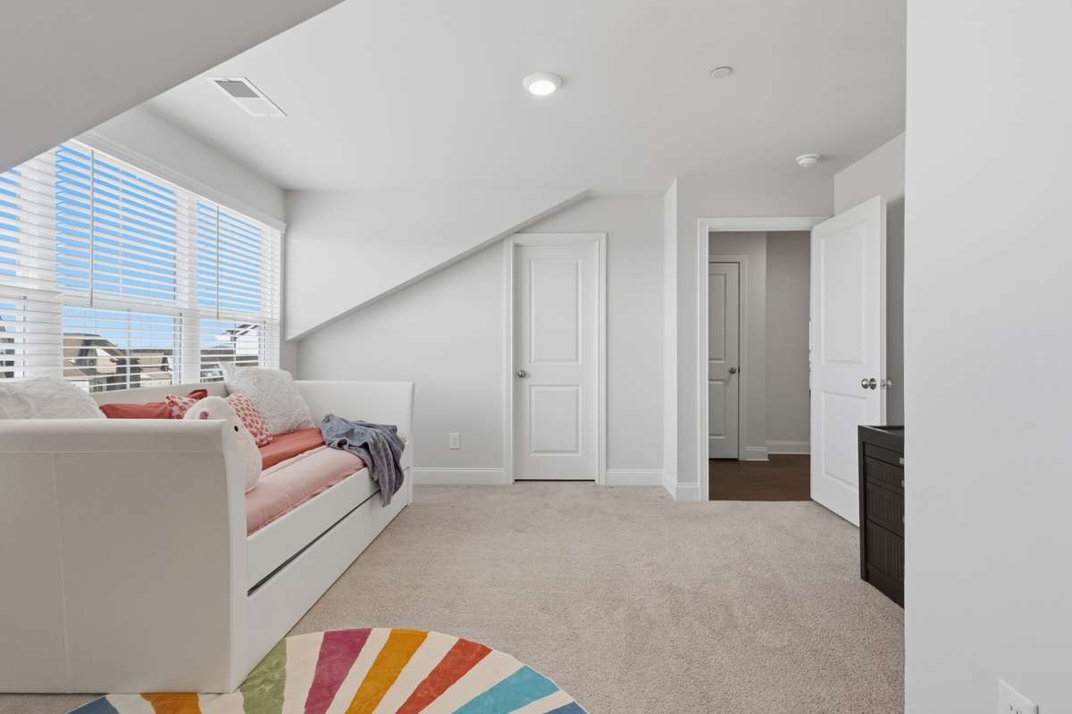 Another view of Bedroom 3 showing upper level landing area.