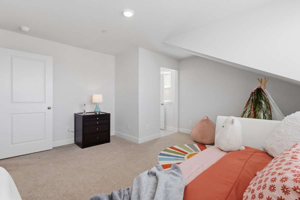 Bedroom 3 has shared bath with Bedroom 2. Each room has separate vanity area.  Large walk-in closet.