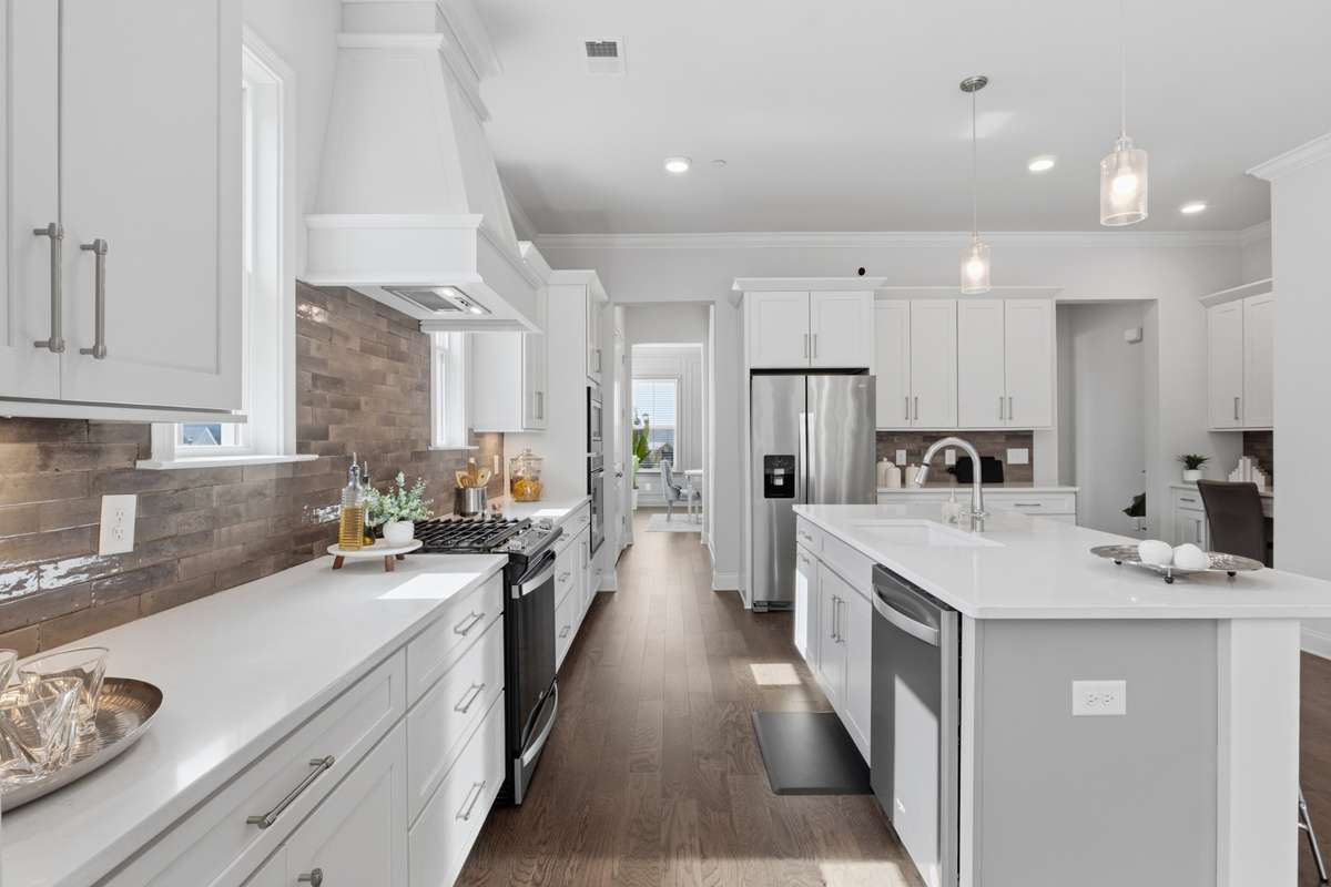 Abundant cabinets and storage along with a large pantry.