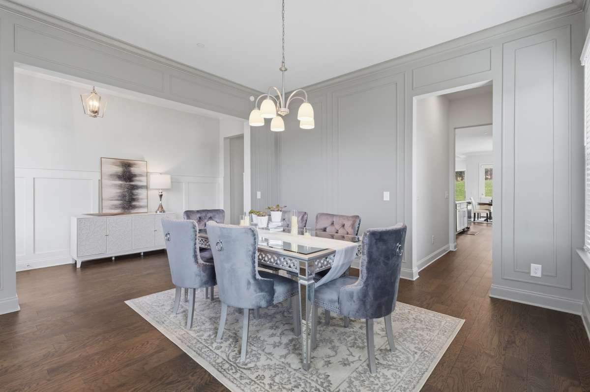 Formal dining room with custom millwork.
