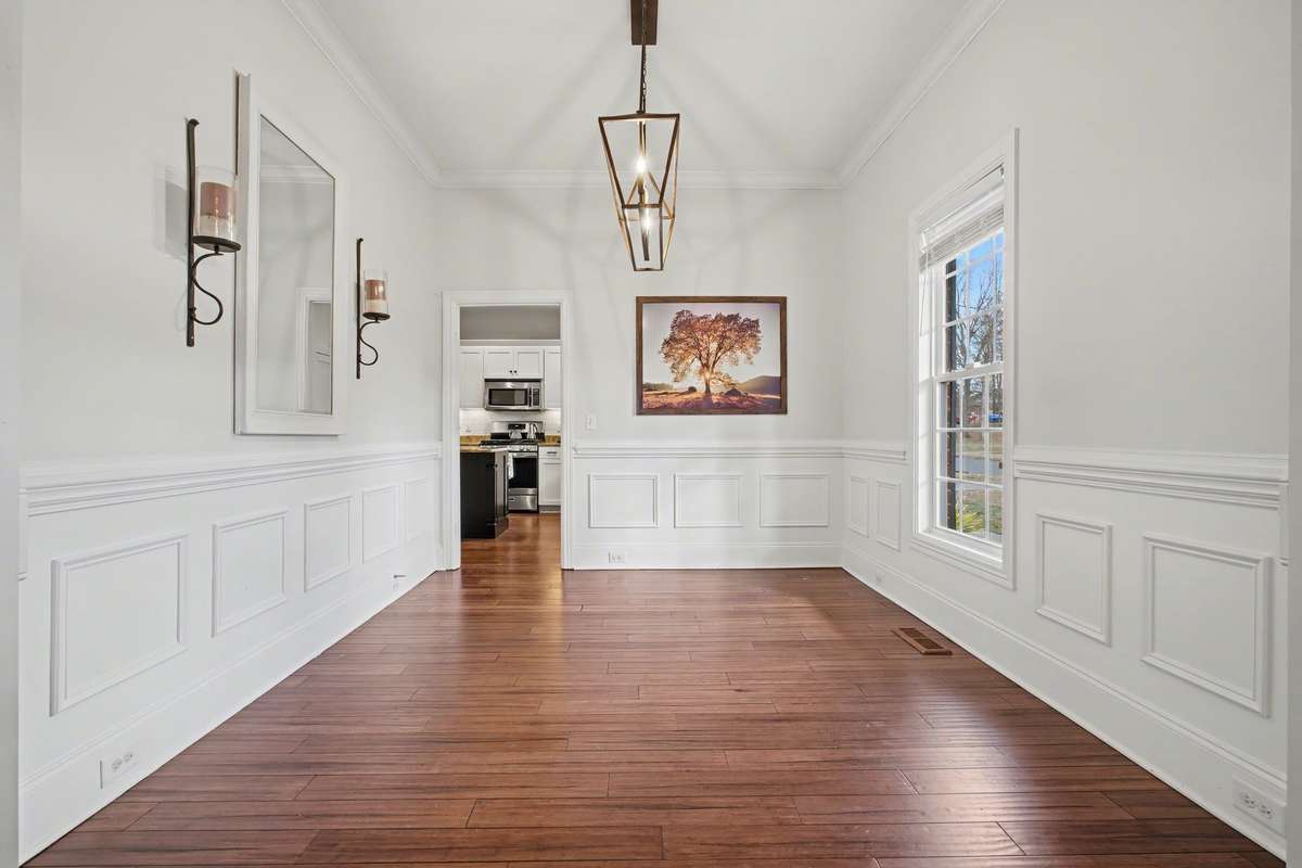 Formal dining room or maybe an office space with plenty of natural light!