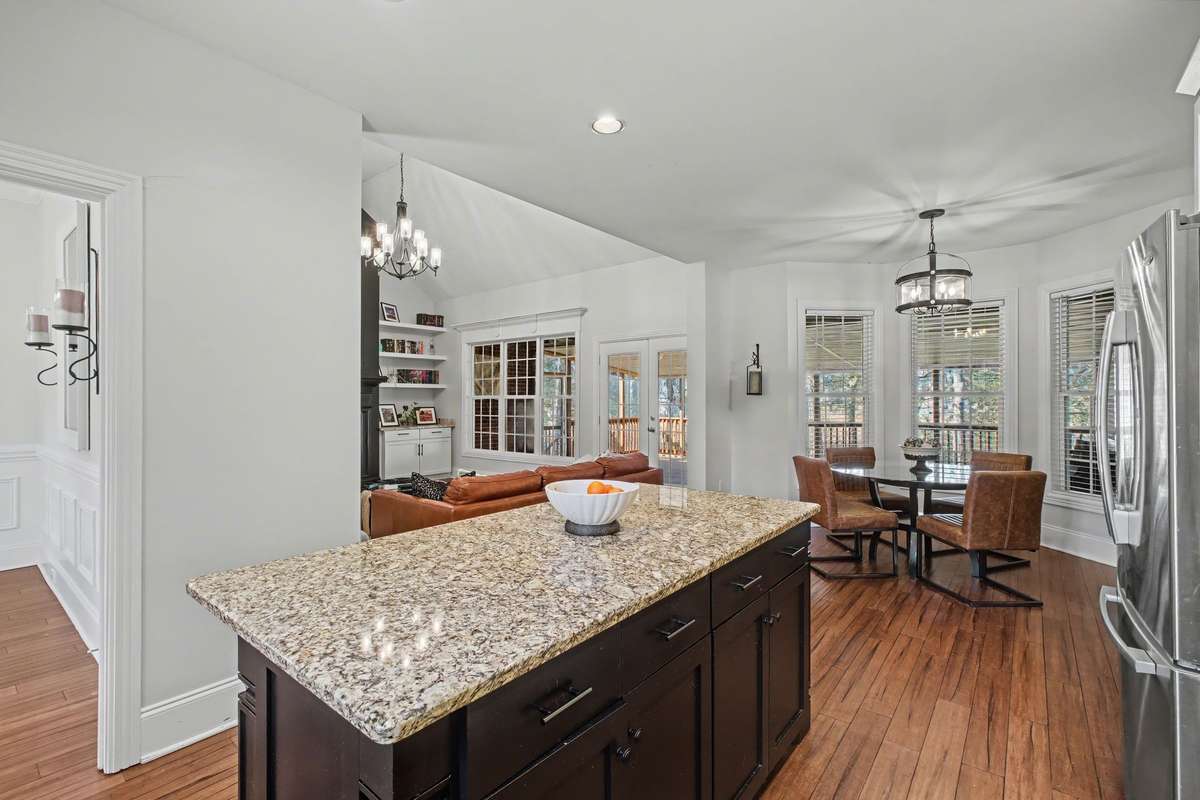 See the additional cabinets/drawers in island. The kitchen set-up is perfect for entertaining!