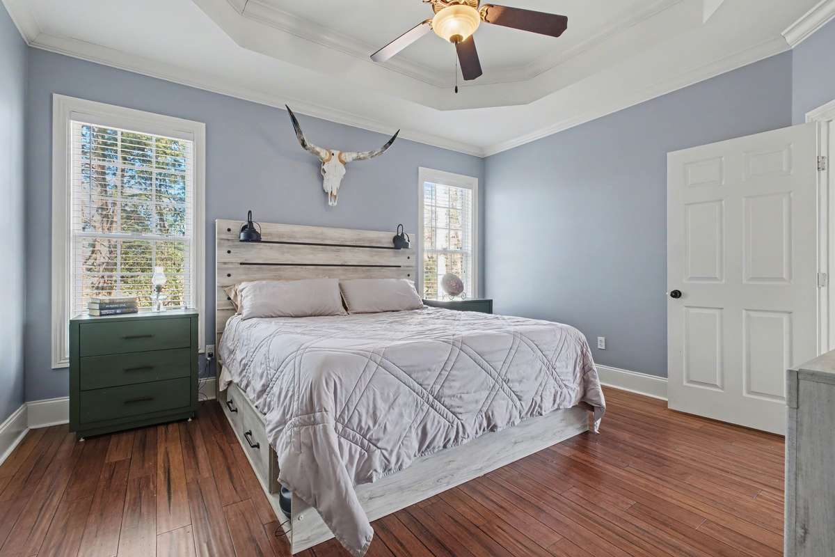 The hardwood floors carry on in the Owner's Suite!