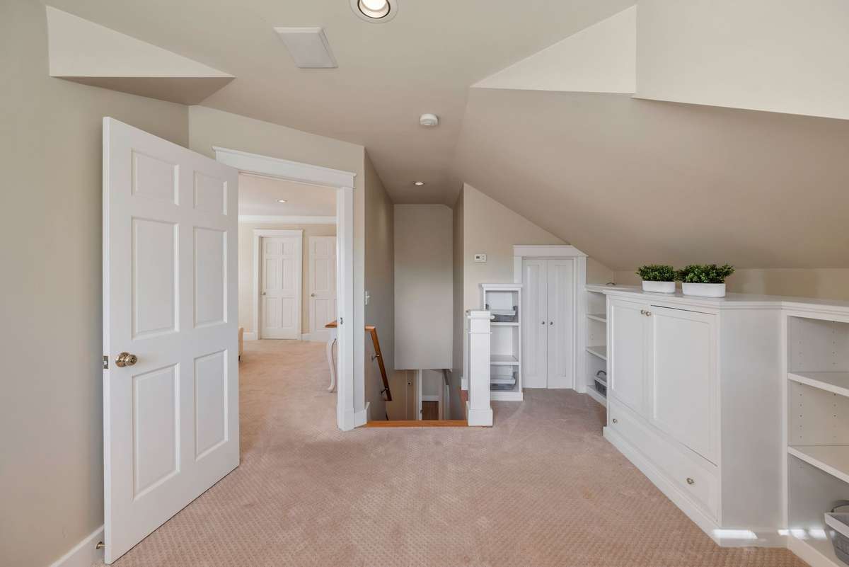 Builtin cabinets in upstairs sitting room