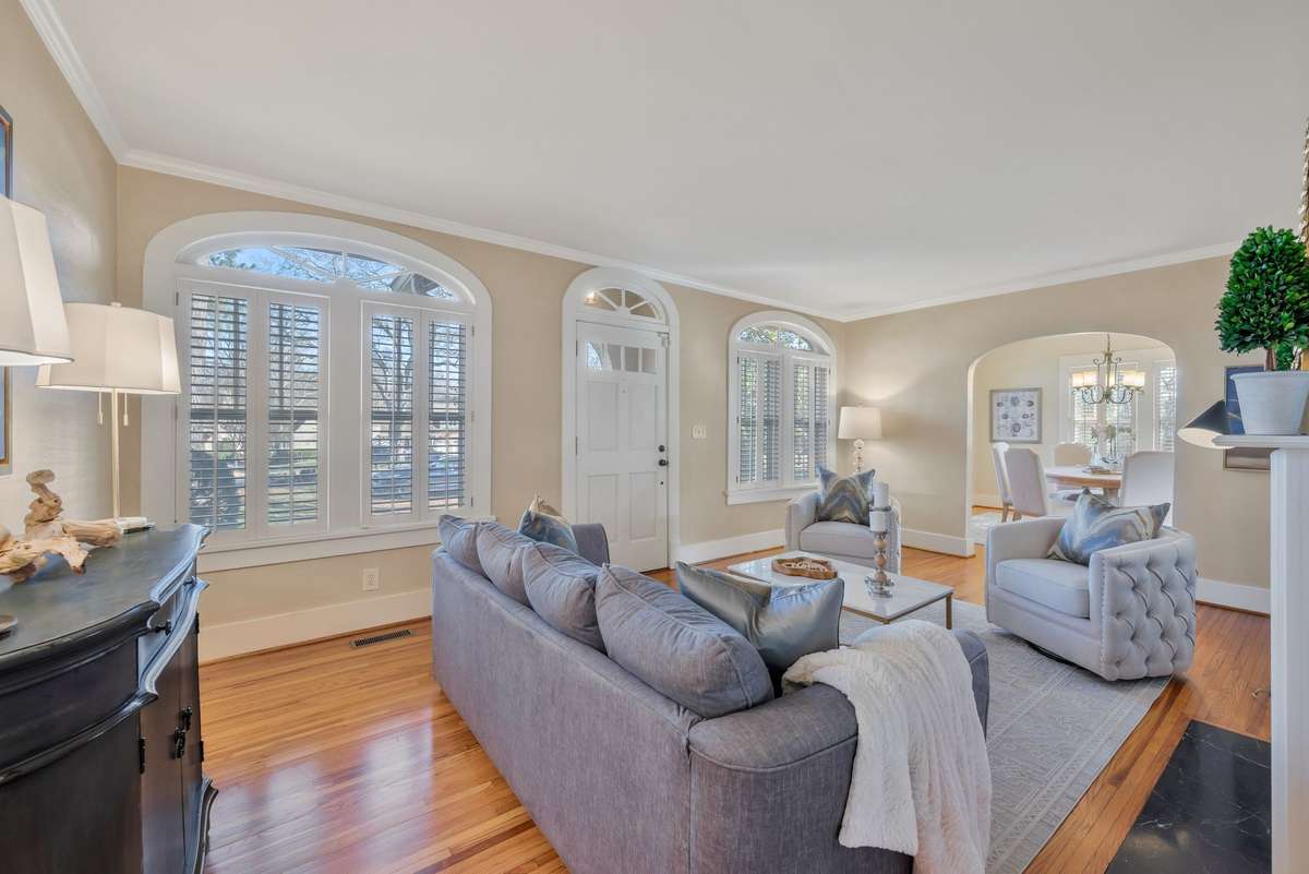 Arched Eyebrow Windows Span the Entire front of the home No need to worry about window coverings shutters are already installed!