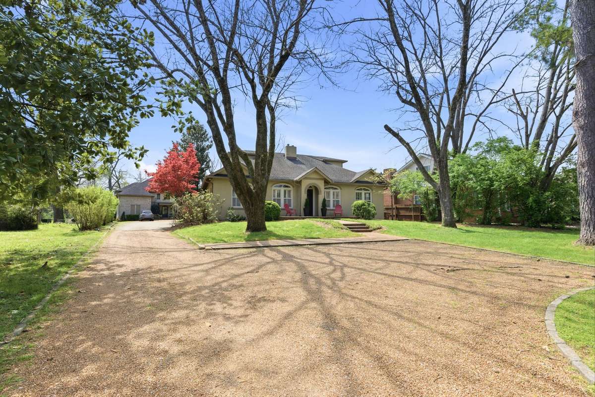 Ample parking for guests as well as an attached oversized 2 car garage at the rear of the home