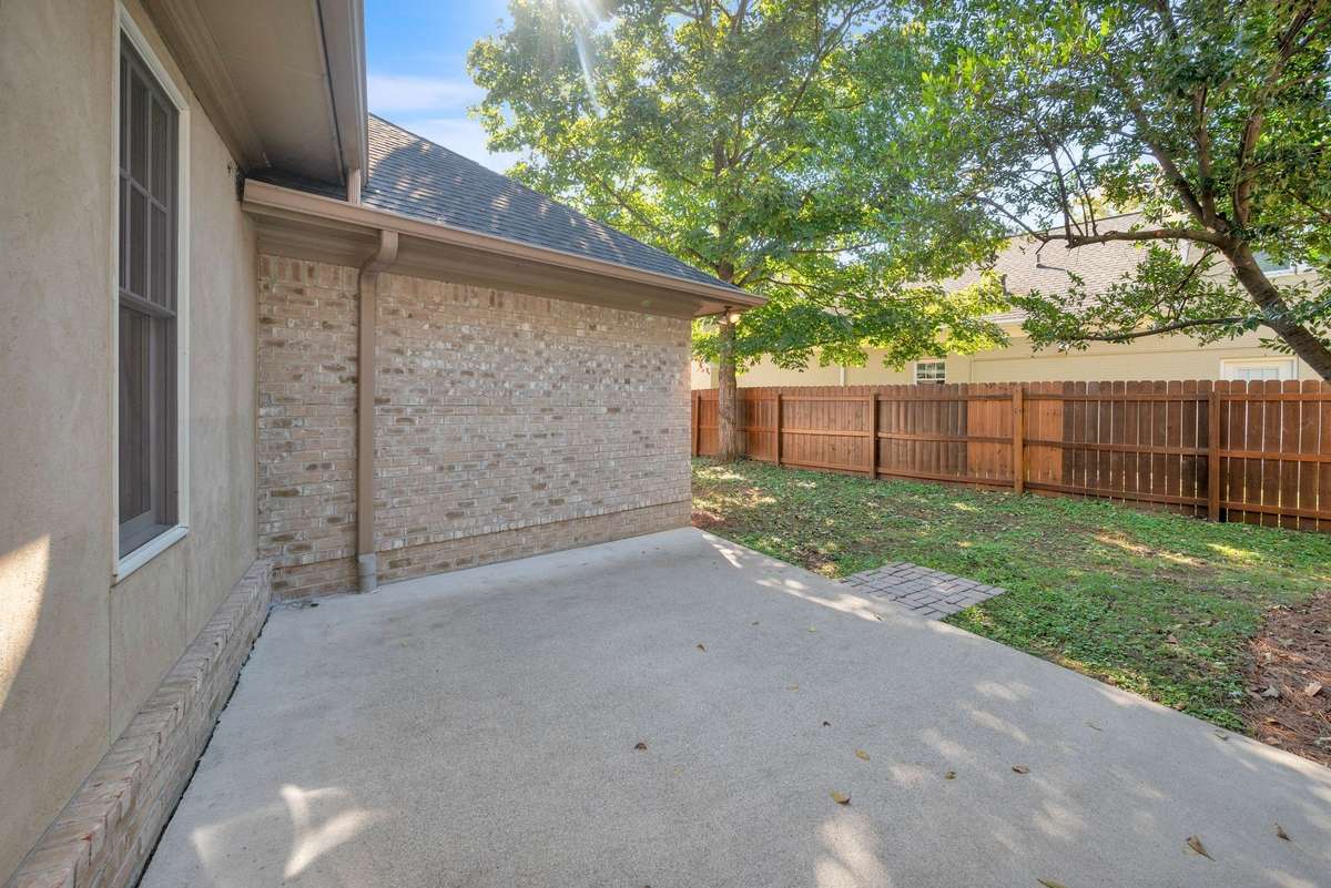 Private Fenced Backyard and Patio off Den