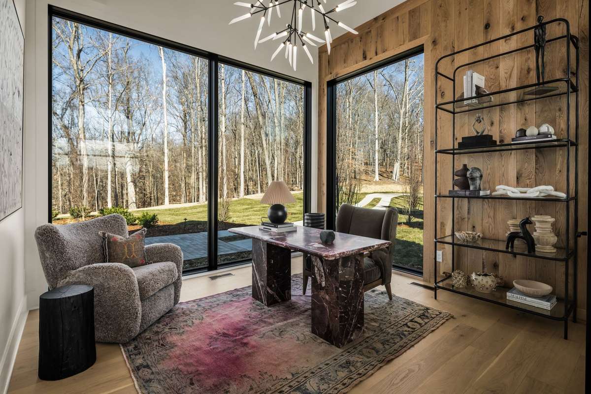 Private office space offering a quiet and refined setting, thoughtfully designed for productivity with abundant natural light and peaceful views.