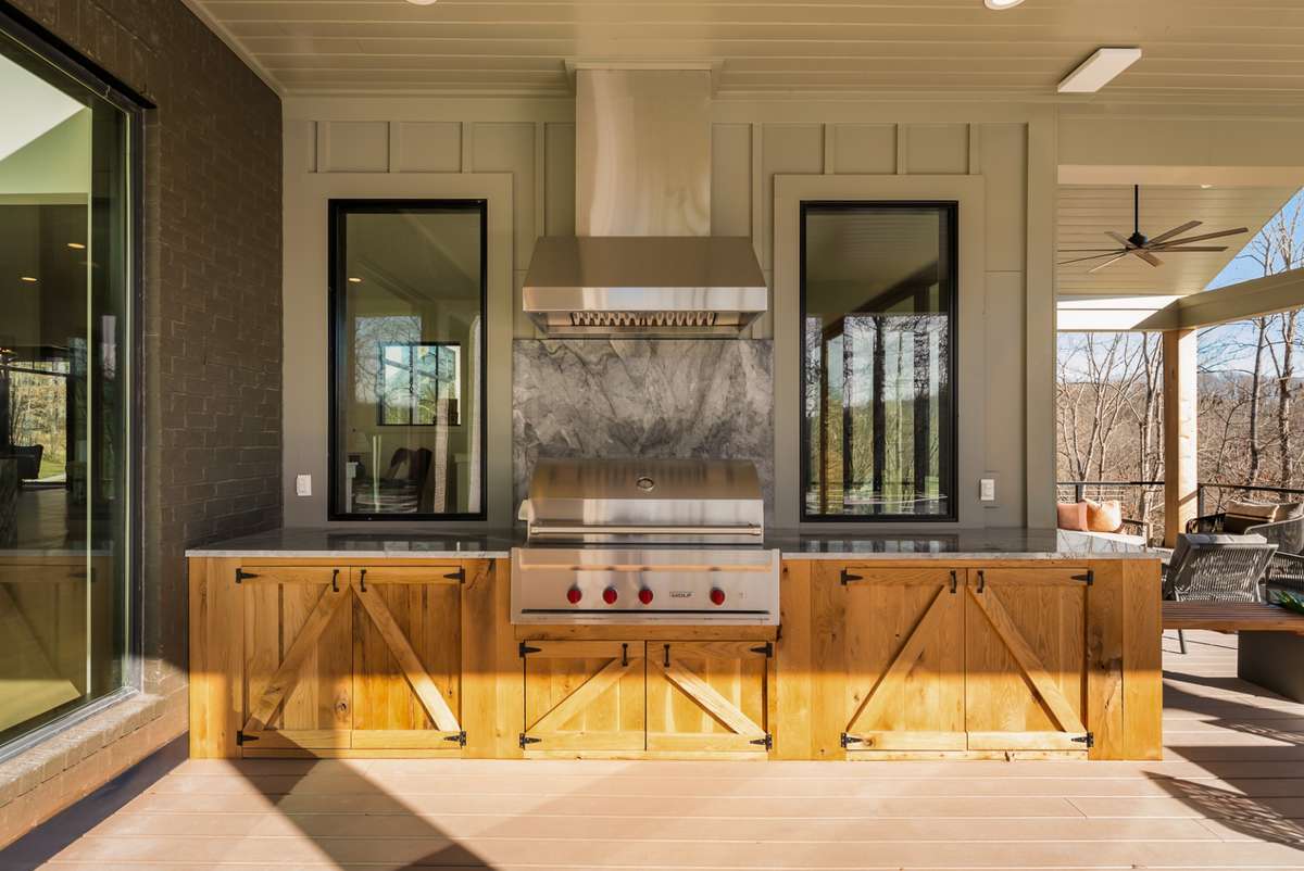 Fully equipped outdoor kitchen, built for year-round entertaining.