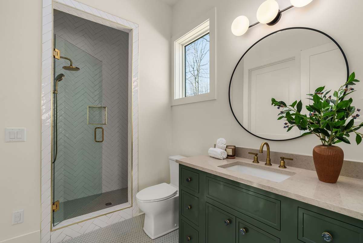 Designed to feel just as intentional as the main residence, the DADU bath offers comfort and elevated finishes.