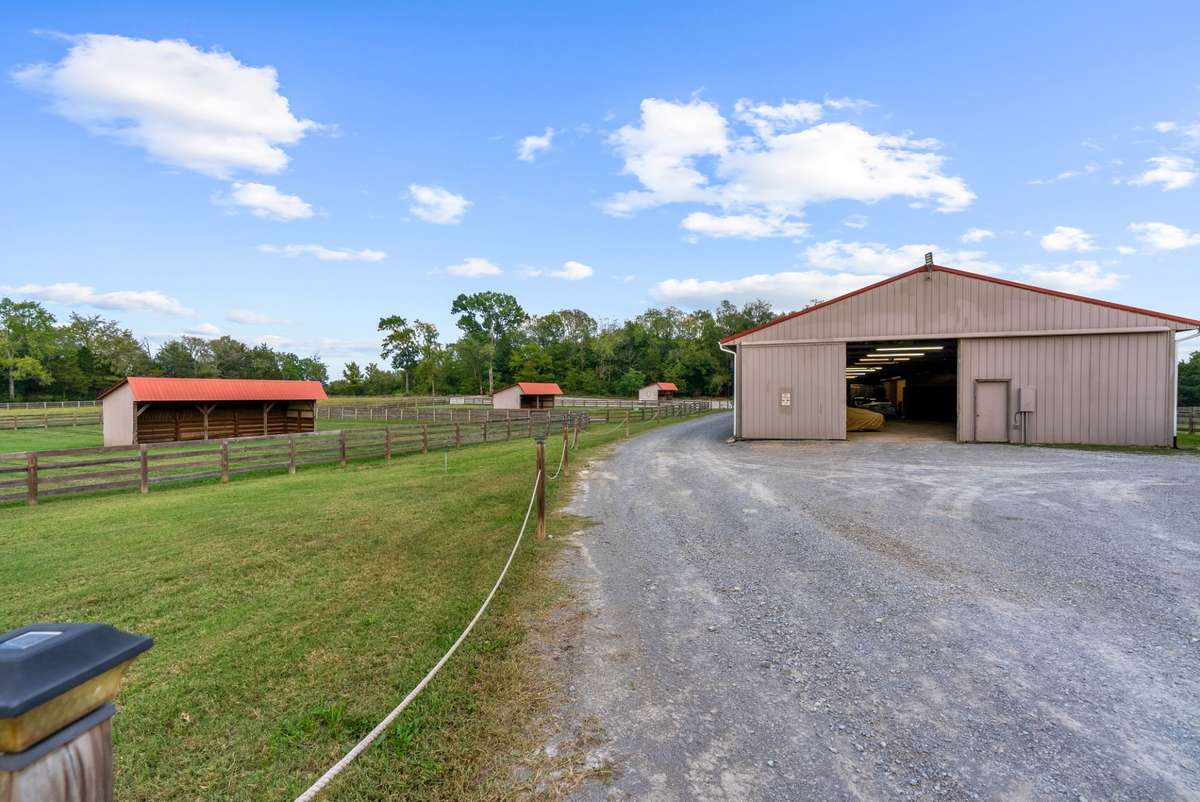 Second Large Barn with Horse Stalls and plenty of Storage.