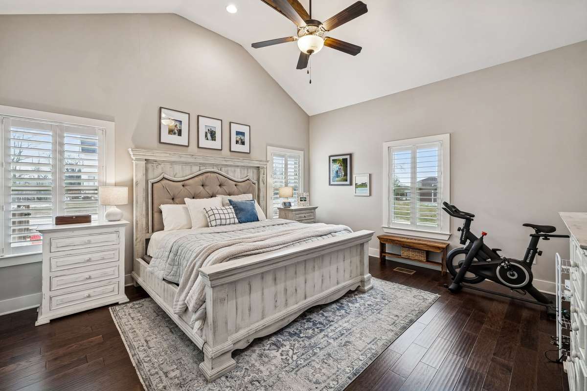 Oversized Primary Suite with Wood Floors, Cathedral Ceiling, Plantation Shutters and an Abundance of Light