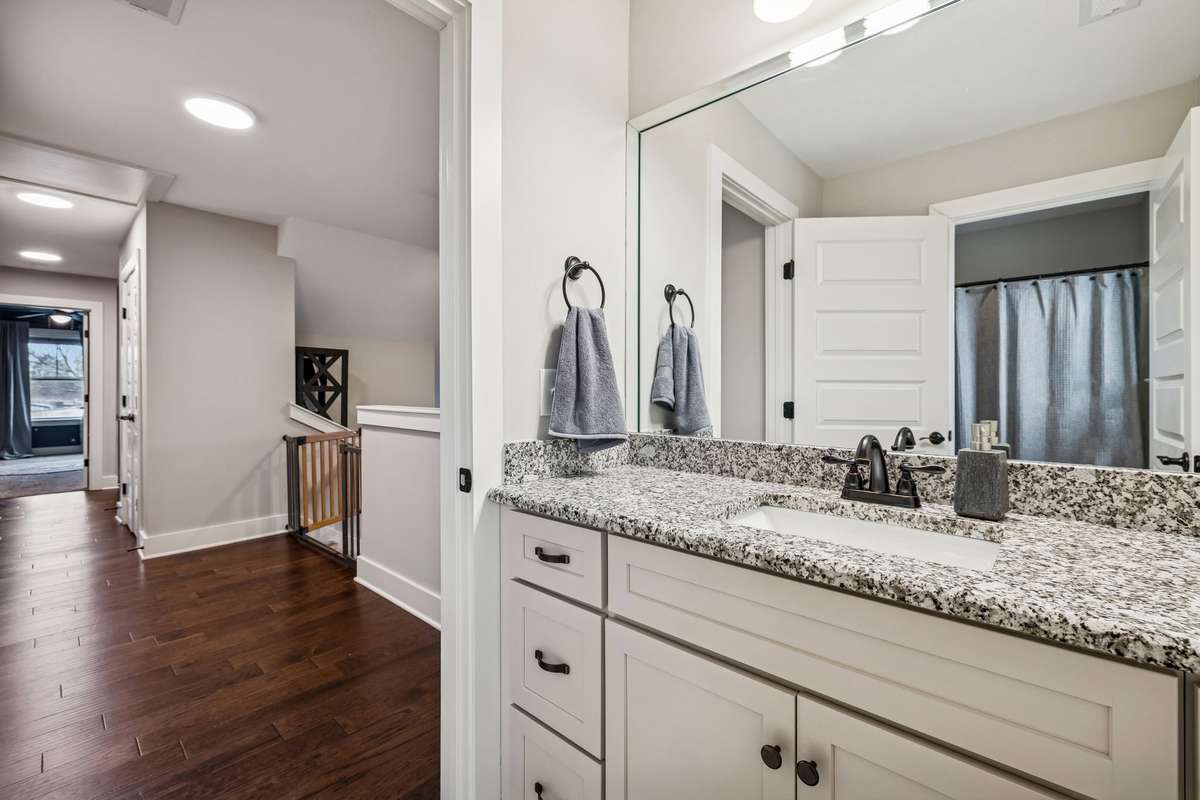 All baths feature granite countertops