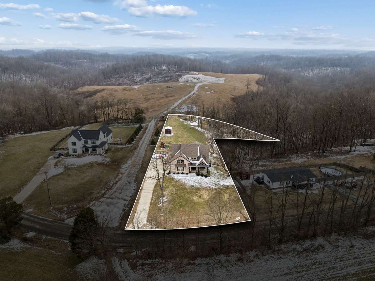 Almost an acre, with No HOA and a fenced in yard. Property behind home features large tracts for estate homes.