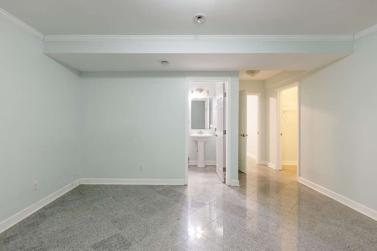First floor bedroom and attached bathroom