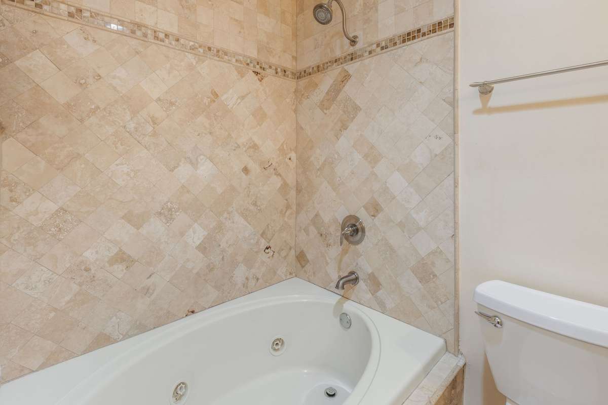 One of the attached upstairs bathrooms