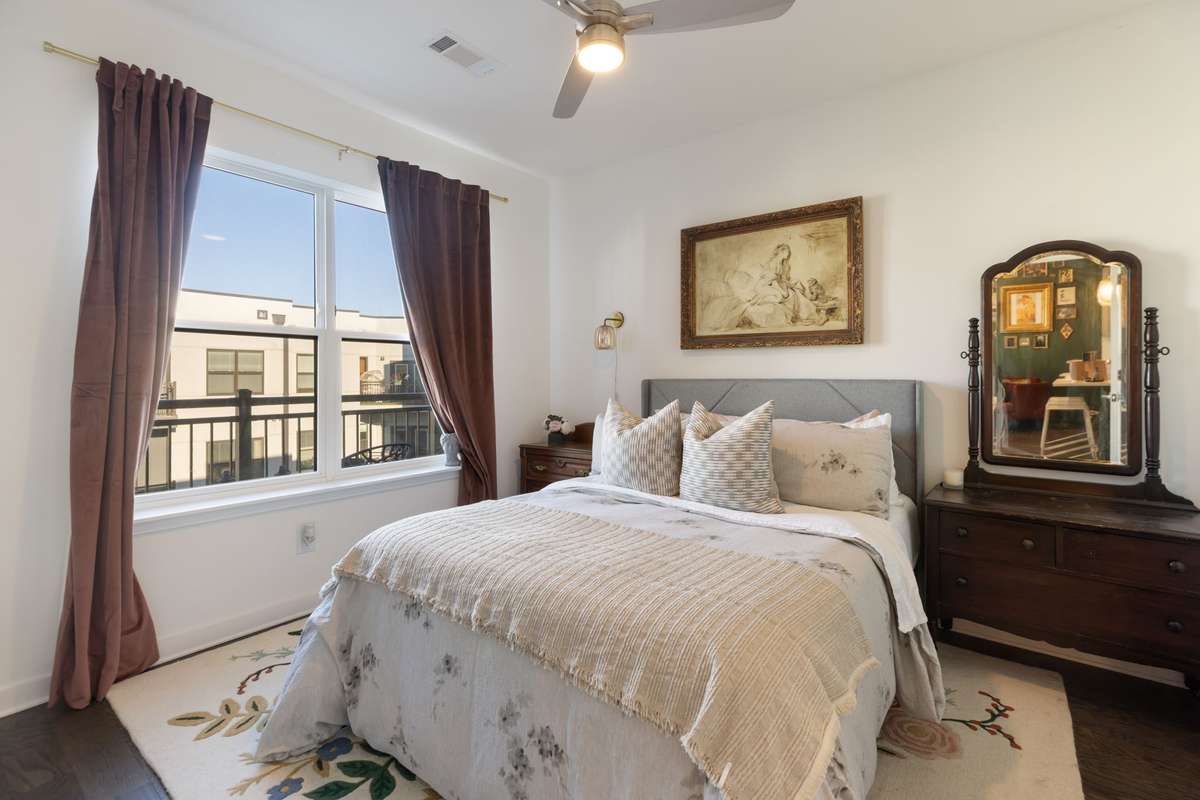 Spacious primary bedroom with oversized walk-in closet separate from the bathroom