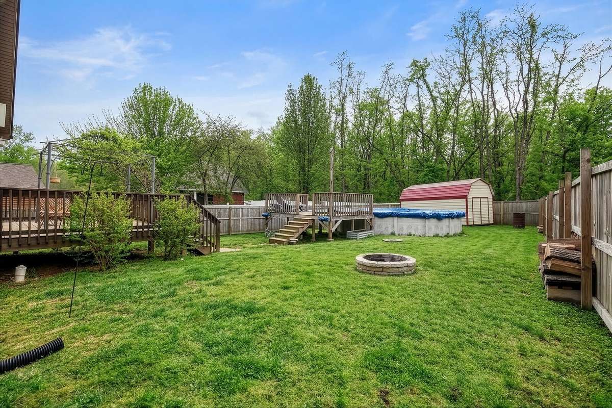 FULLY Fenced Yard - Backs Up To Woods! Deck, Above Ground Pool, Shed & Firepit!
