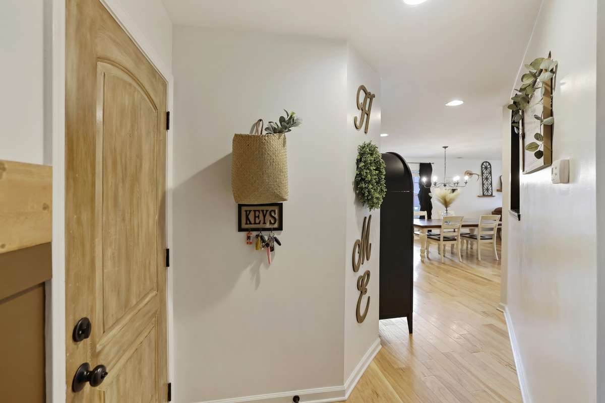 Custom painted interior door leading to garage.