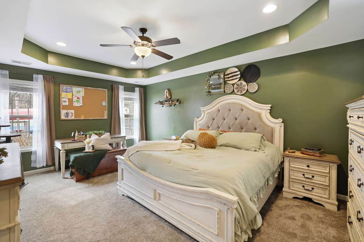 Spacious owner's suite, flooded with natural light.