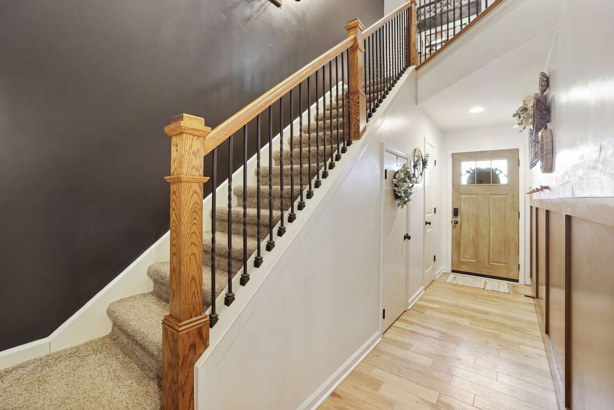 This home has so many upgrades and custom features... must see. Check out the custom entrance wall complete with hooks for your coats and bags!