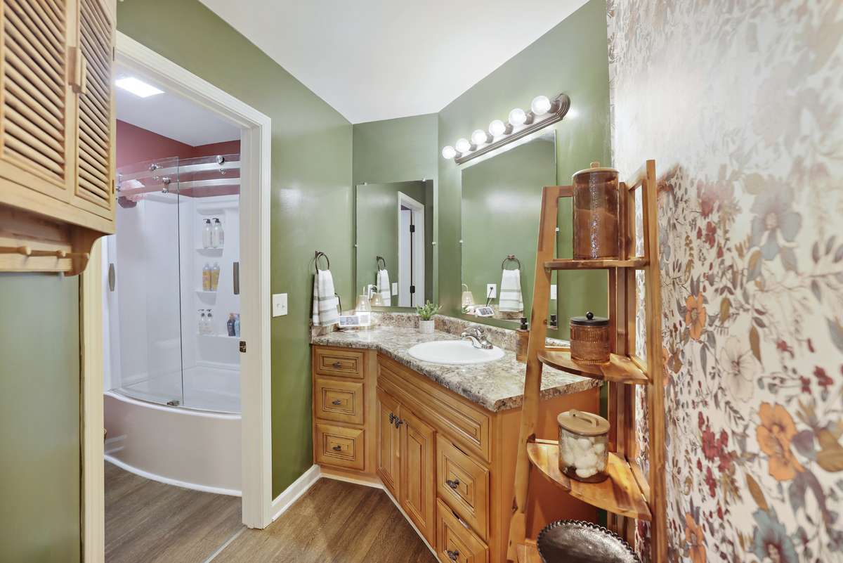 Newly done floors and master shower/tub!