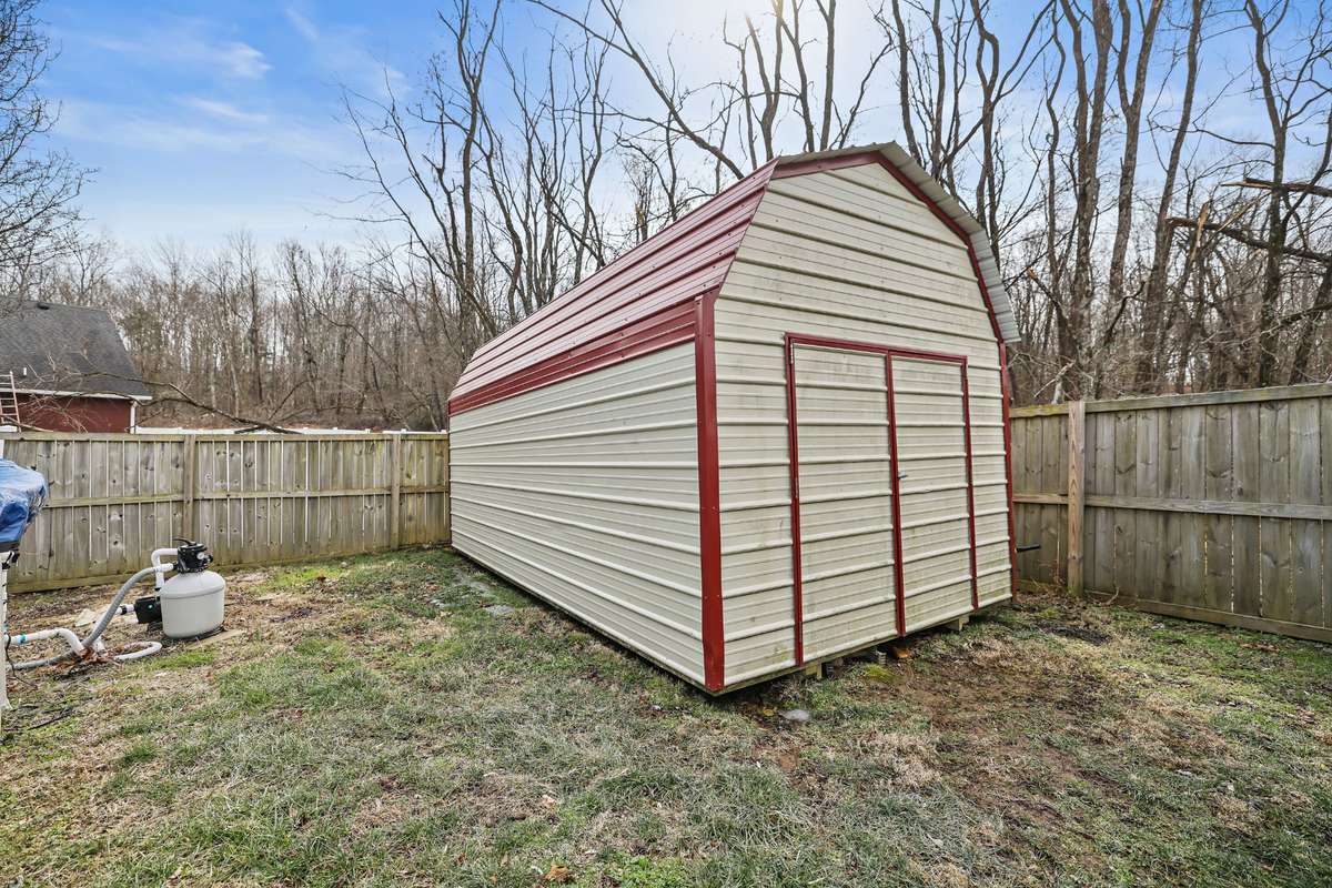 Gigantic shed is perfect for all of the tools and toys that don't fit in the garage!