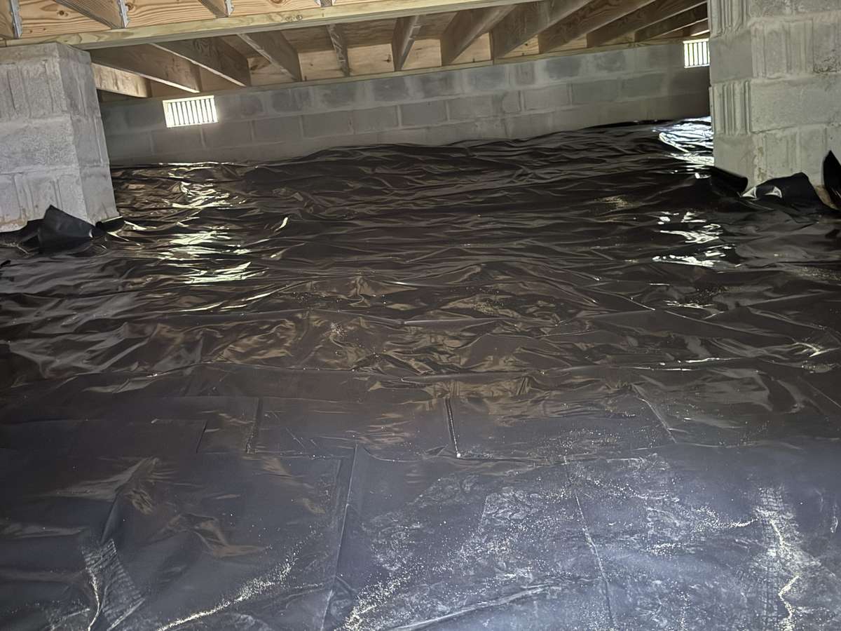 Crawlspace is dry and completely covered with vinyl covering