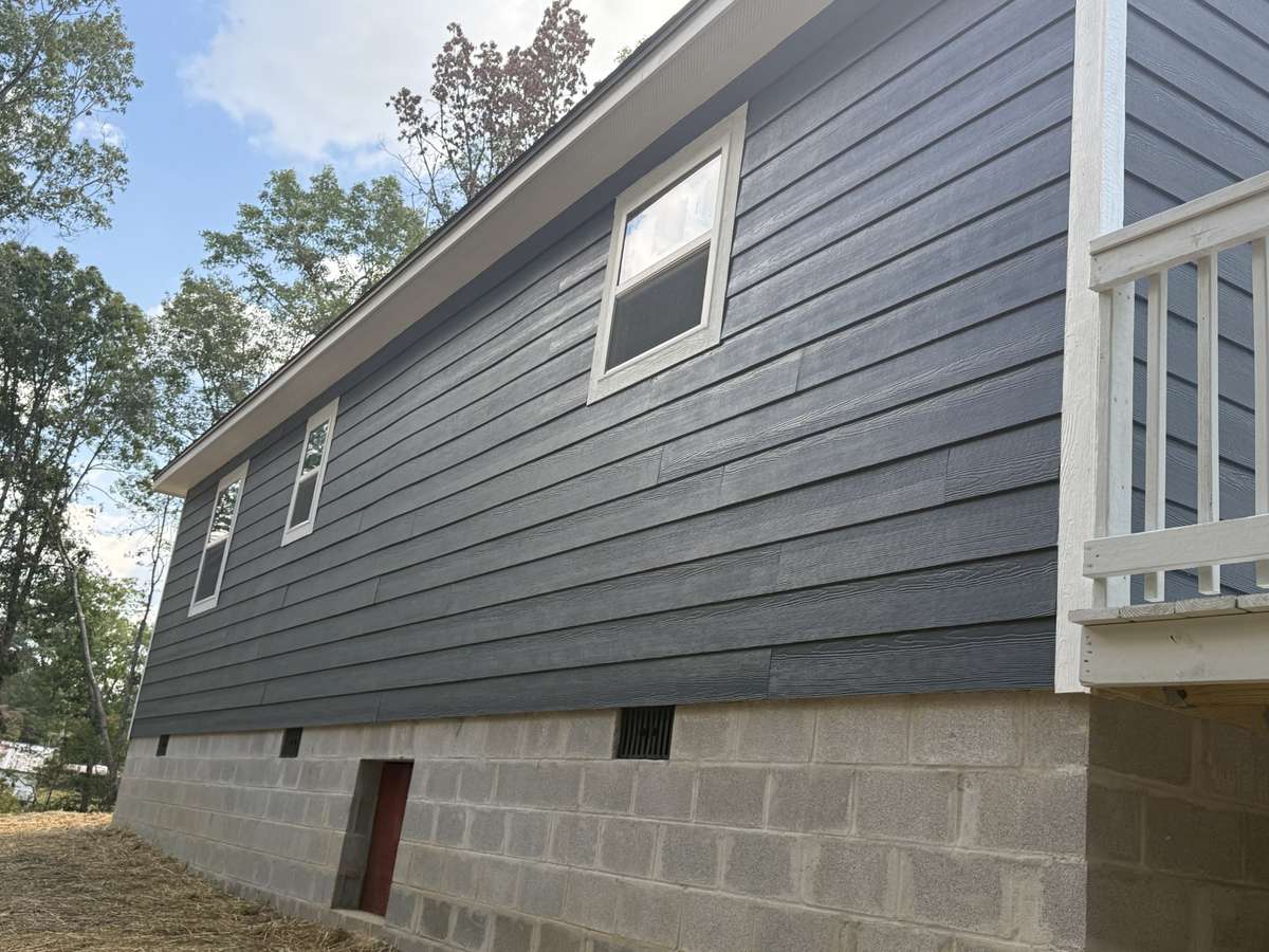 Block construction with entrance door to crawl space.
