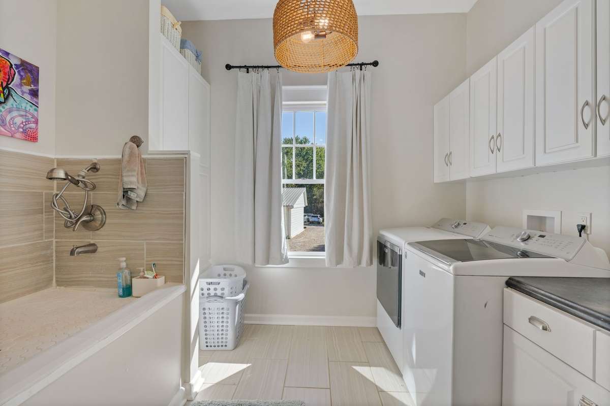 There is a large and efficient laundry on the first floor. You're doggy friends will love their own shower.
