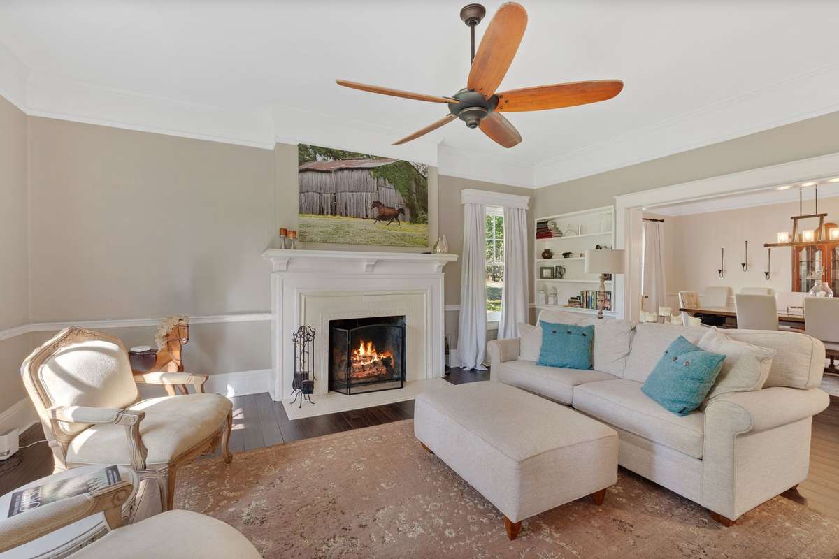 Enjoy great conversations in this beautiful living room off of the dining room.
