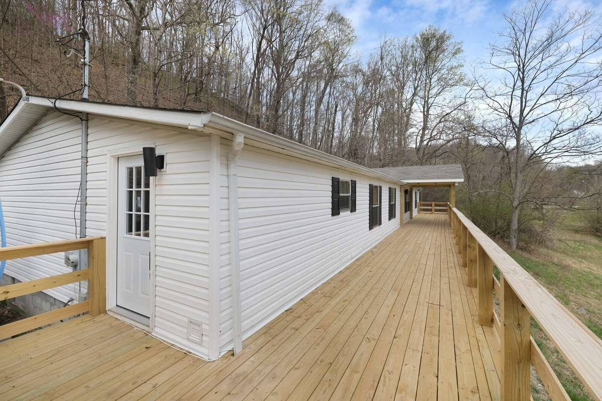 Side door (right inside is laundry room and drop-zone)