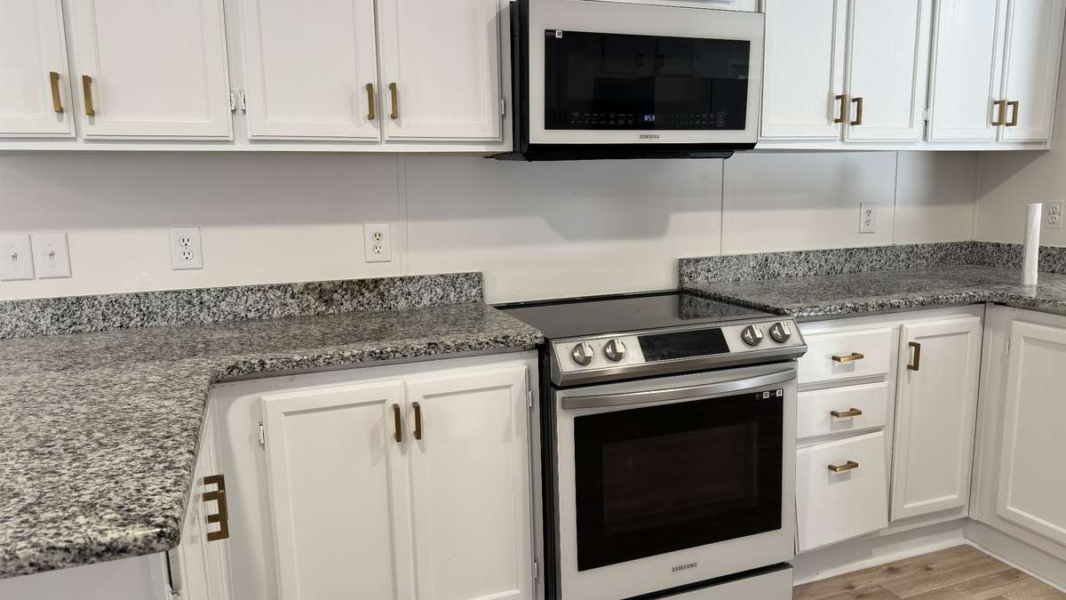 granite surfaces, soft close drawers