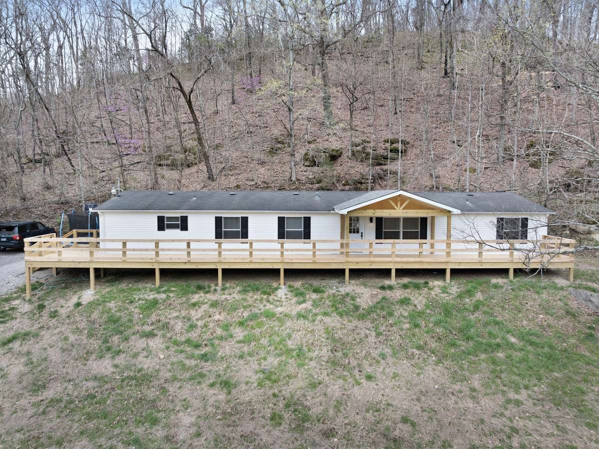 home is nestled against the hillside