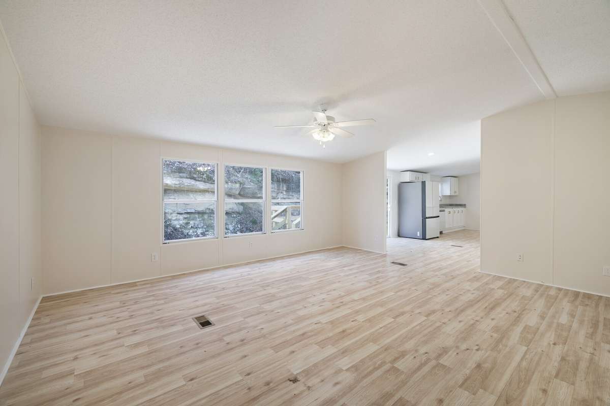 Living Room with view into Kitchen area