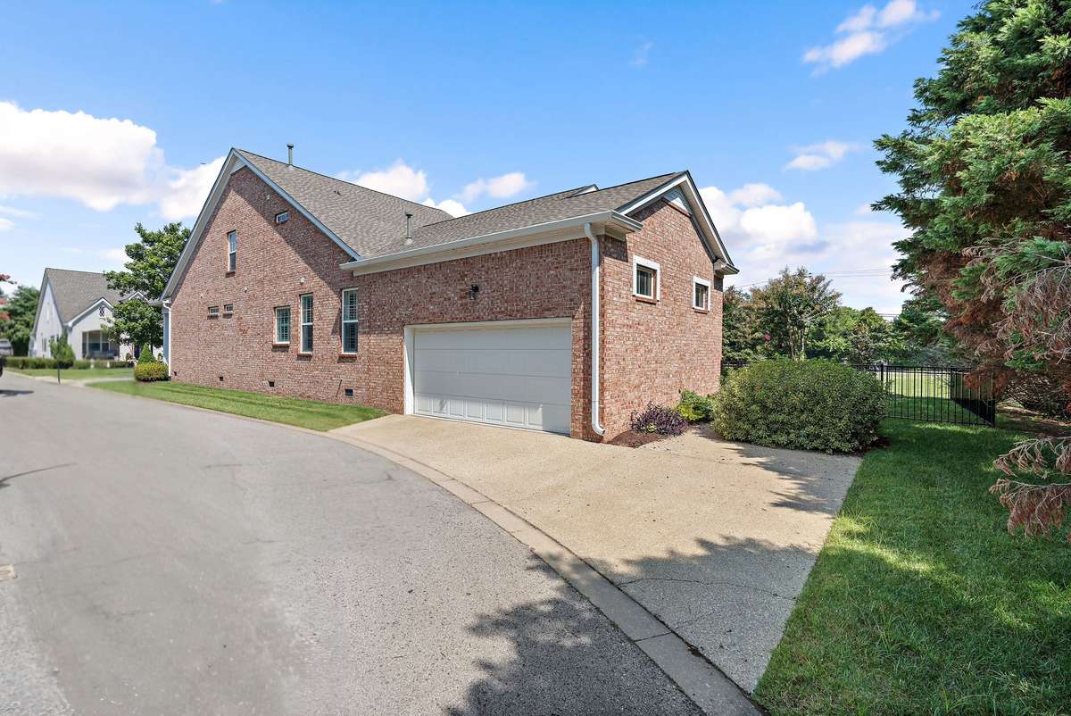Two car garage and parking pad