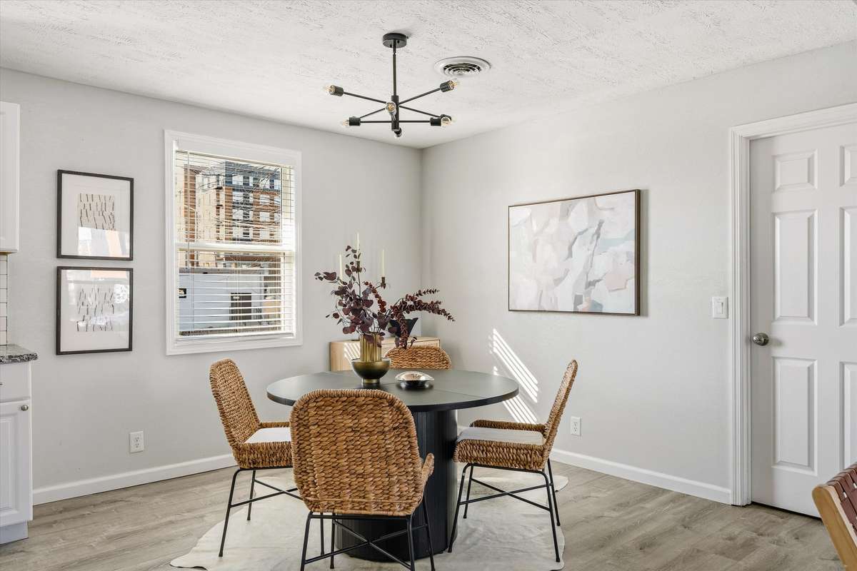 The door to the basement is located just off the dining area.