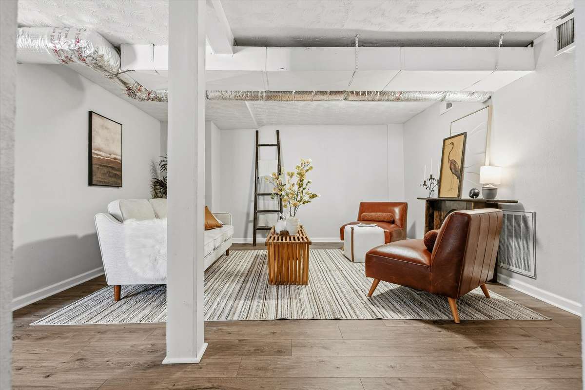 The basement flex room provides a second living space - can be utilized as a movie room, kids' playroom or home gym!