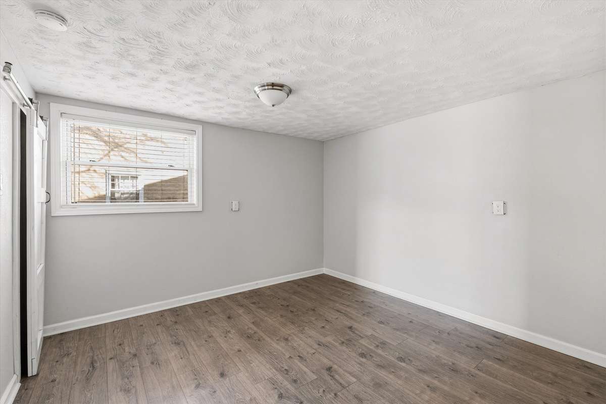 The third bedroom is located in the basement. This room still gets plenty of natural light and is perfect for guests!
