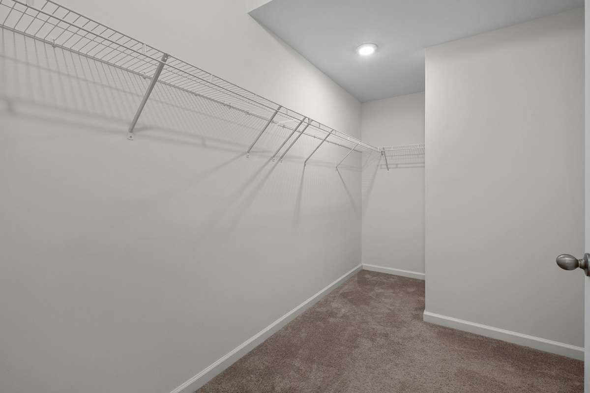 Primary bedroom large walk in closet