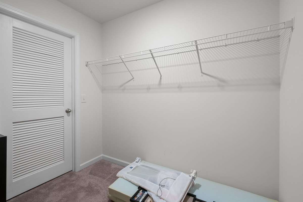 Upstairs walk in closet for bedroom 3 (could be used as mother-in-law quarters)