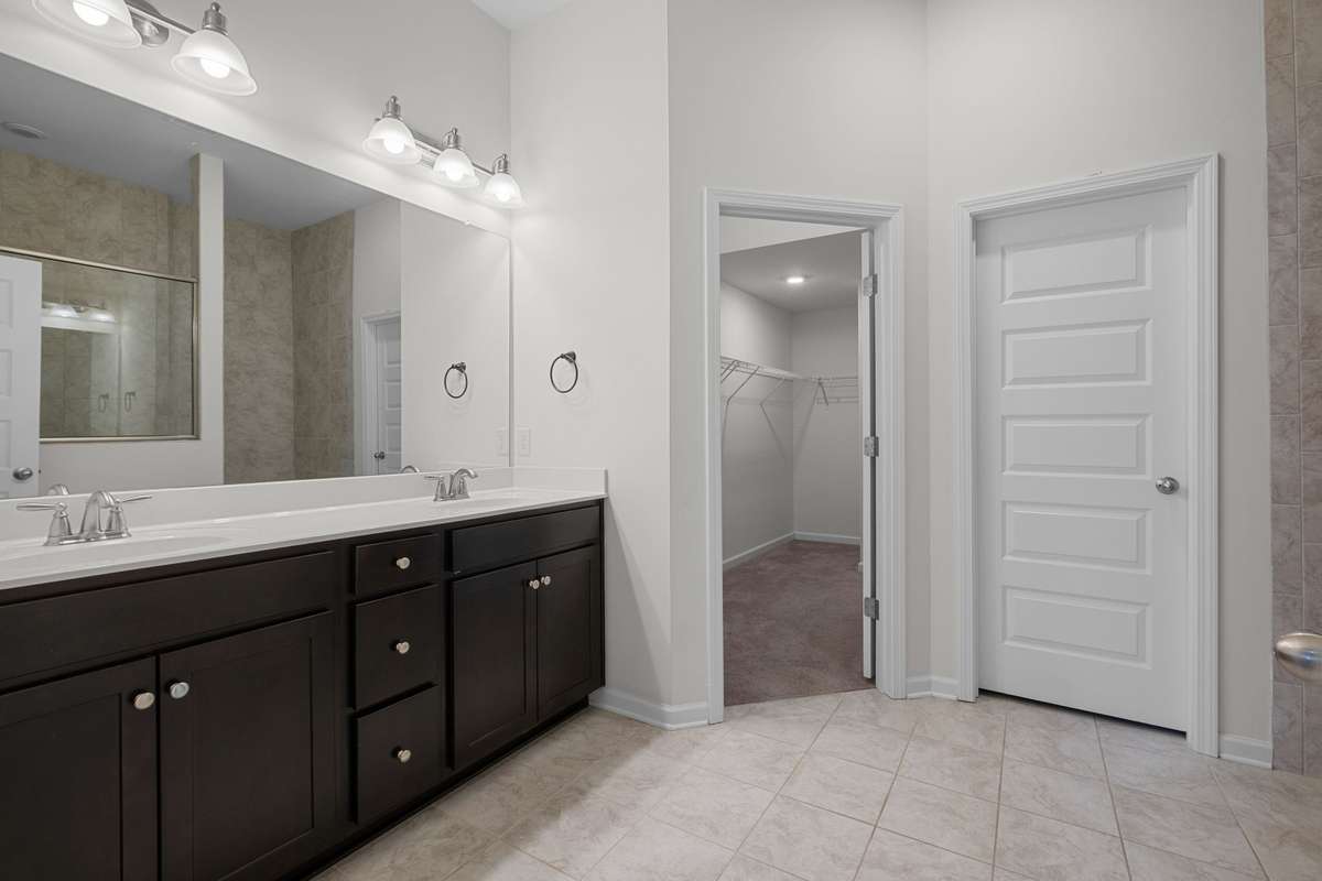 Primary Bathroom with double vanities