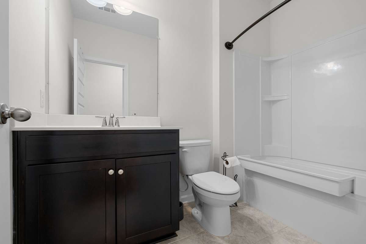 Downstairs Bathroom 2 convenient to Bedroom 2 and living room