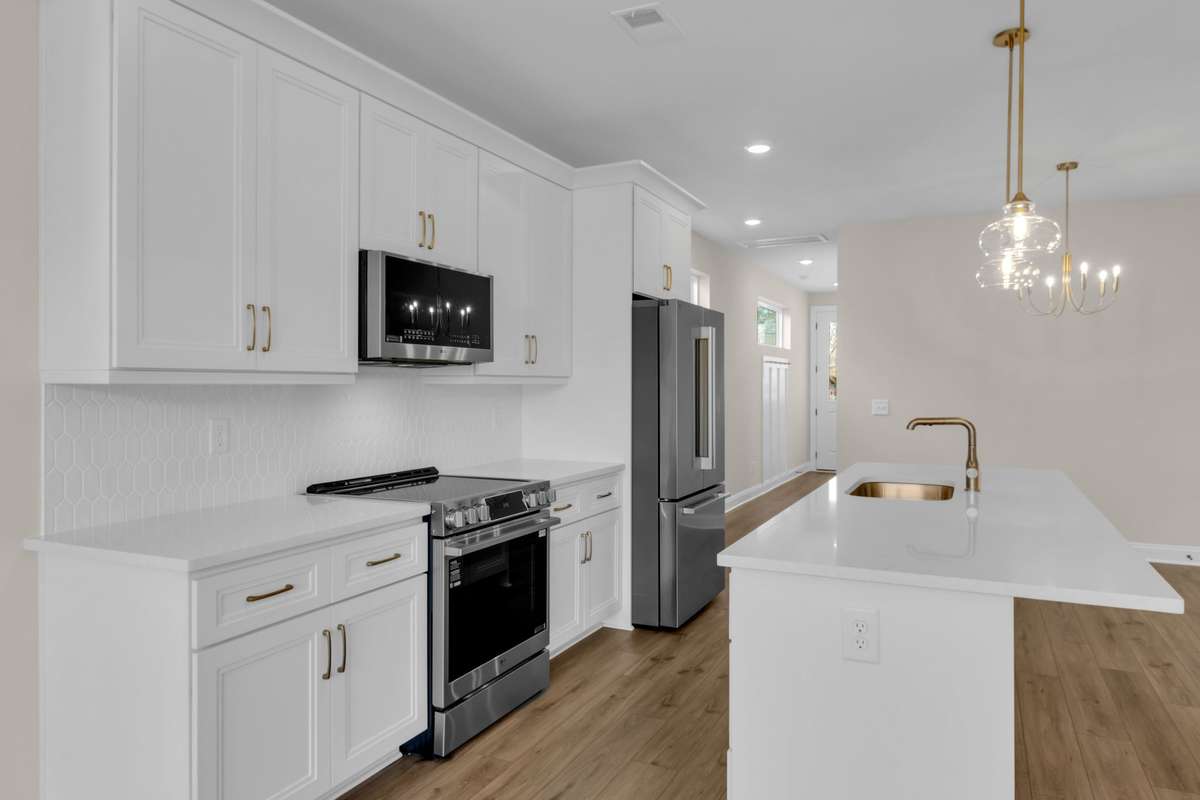 Upgraded kitchen with LG appliances and designer light fixtures. Ready to make dinner or bake cookies for your friends or family in this beautiful space?!