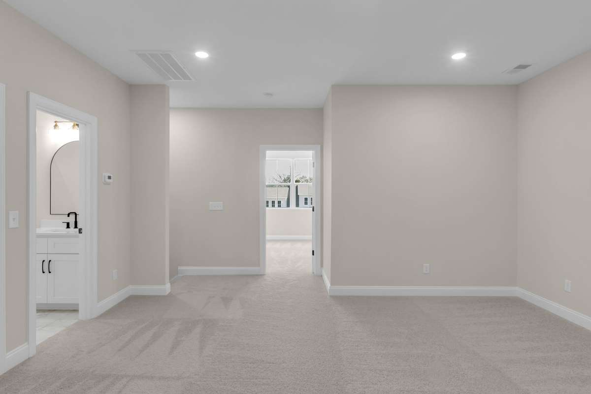 Another view of the loft to the full bathroom and full bedroom.