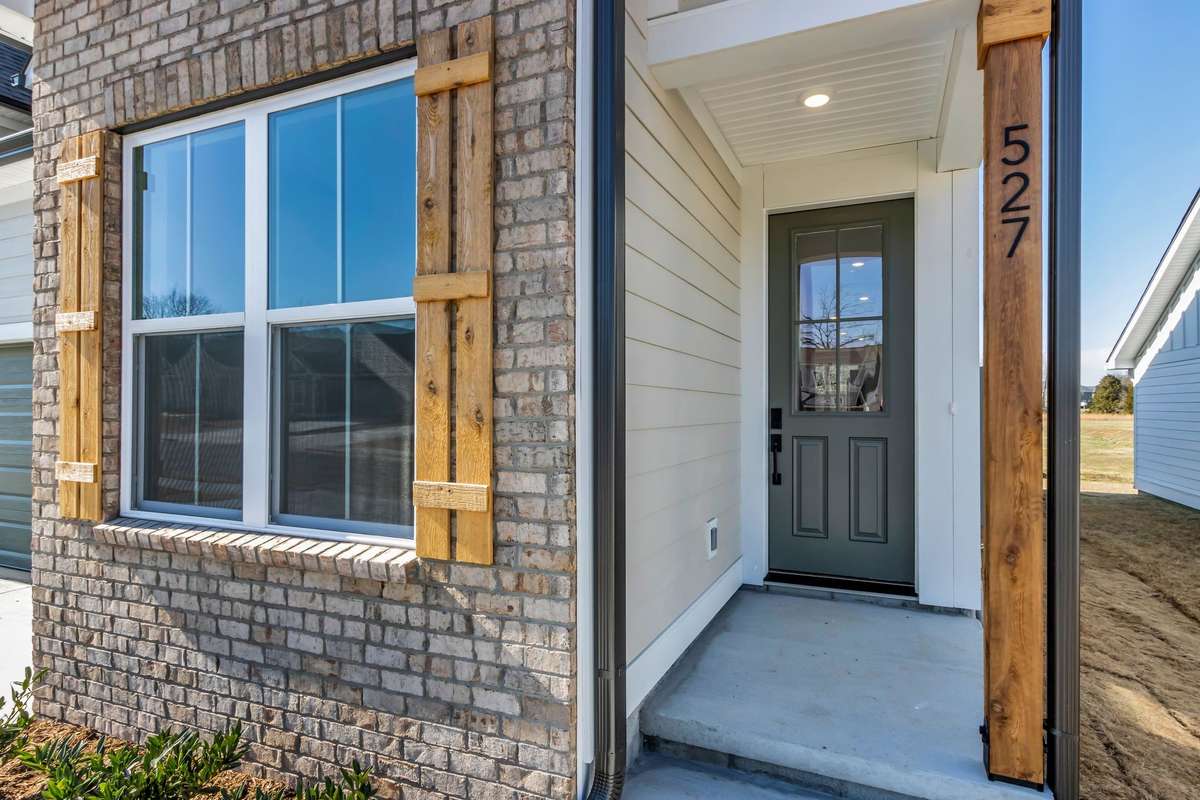 Front entry to the home with an included smart front door lock to make life easy to be on the go!