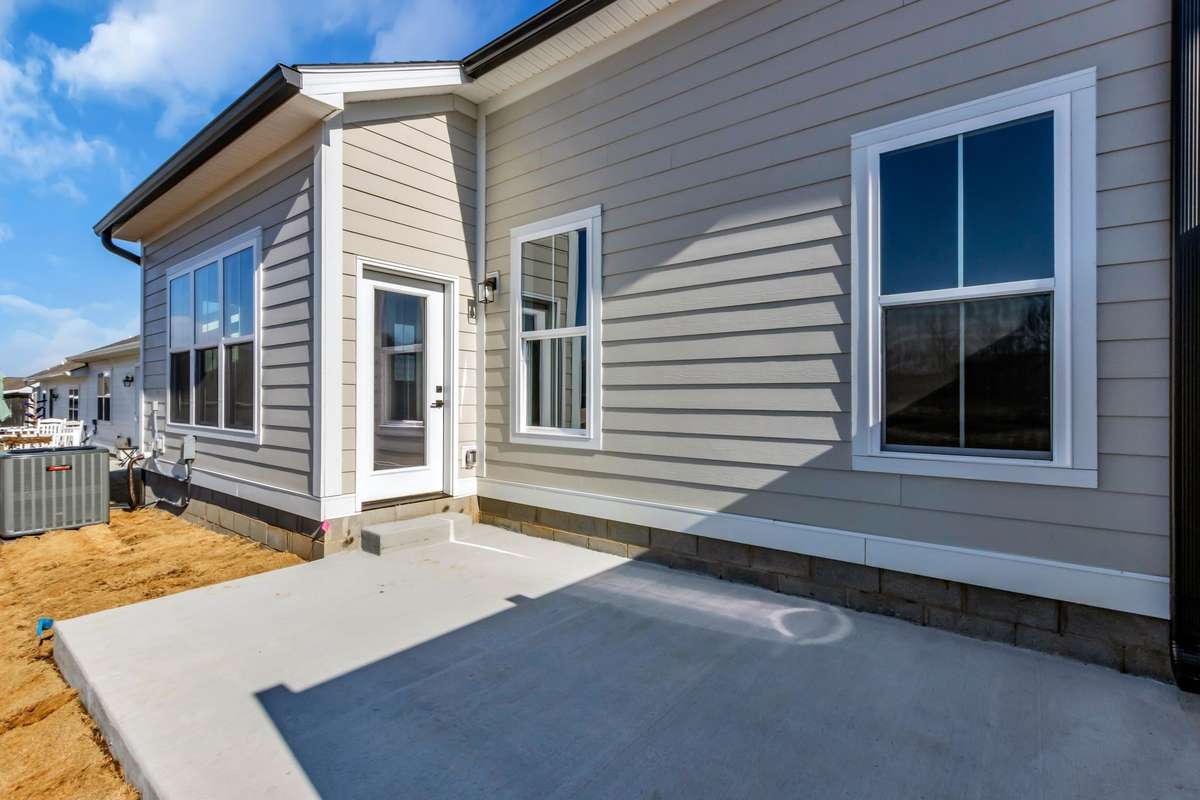 Patio off your great room with plenty of space for table & chairs.